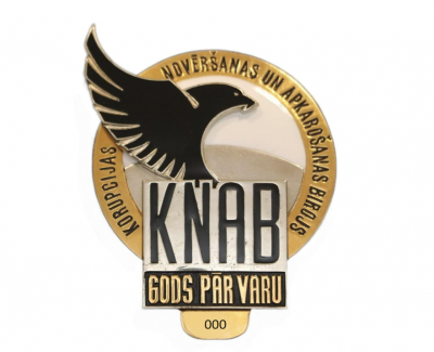 KNAB žetons - KNAB logo, zem tā vieta žetona numuram.